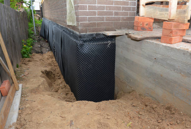 SJ Waterproofing Pros technician performing targeted Sump Pump Installation assessment in Mount Laurel, NJ